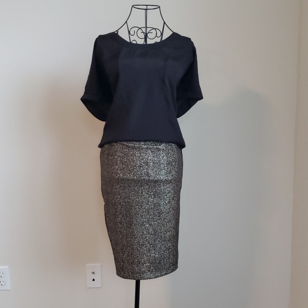 Black top and gold skirt